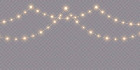 Romantic heart-shaped fairy lights forming a seamless garland border. Perfect Valentine’s Day decoration featuring bright glowing bulbs on a transparent background. The LED heart garland © Максим Славов