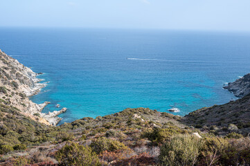 Aerial view of the beautiful Cala Sirena with blue and turquoise water