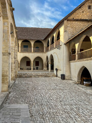 Fototapeta premium The old town of Omodos in Cyprus with historic buildings, narrow streets with shops focused on selling regional souvenirs, arts and crafts