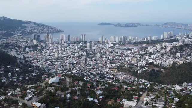 Aerial view approaching the coastal of Acapulco.