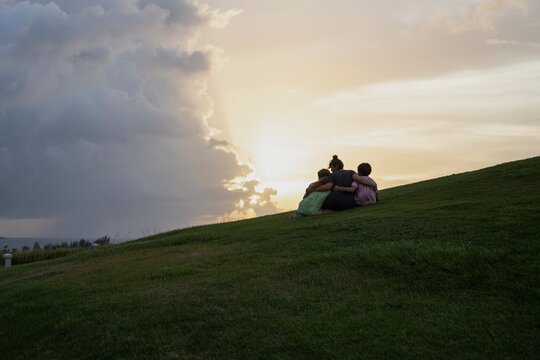 Family Watching Sunset in Old San Juan
