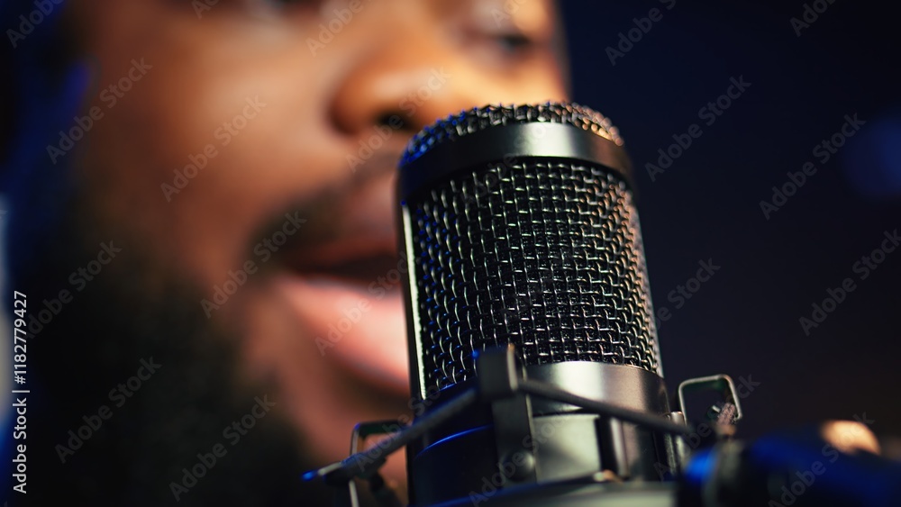 Leinwandbilder artist records his voice on microphone in home studio singing a song composed by him. skilled musici