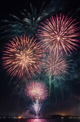 Colorful fireworks display against dark sky