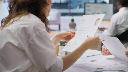 Team of recruiters working together to choose the right applicant with the best qualifications to...