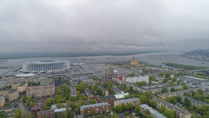 City with a large stadium in the background. Nizhny Novgorod
