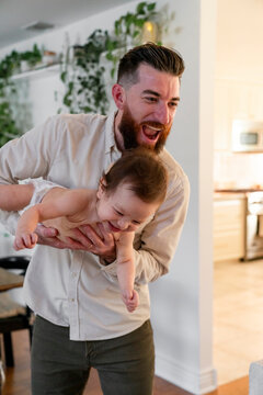 playful dad daughter