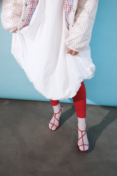 Anonymous woman in stylish outfit