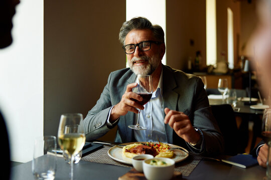 Businessman enjoys lunch at the restaurant