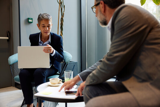 Man and woman doing business