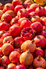 India, Delhi, New Delhi. Pomegranates at fruit market.