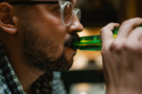 A man drinks beer
