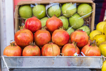 Berna Bugh, Kangan, India. Fresh pomegranates at a market in a village of Jammu and Kashmir.