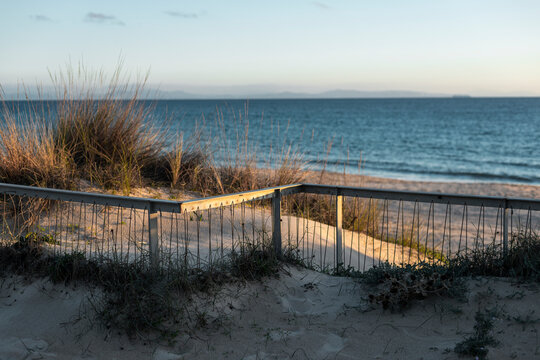 Rustic fence and ocean view to african coastline