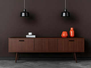 Modern Interior with Wooden Sideboard, Orange Vases, and Books Under Hanging Black Lamps on a Dark Wall