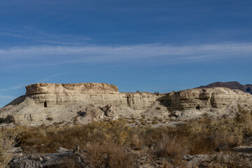 Fototapeta premium Lacustrine deposits are sedimentary rock formations which formed in the bottom of ancient lakes. Shoshone, Inyo County, California. Lake Tecopa is a former lake. Tecopa Lake Beds. Mojave Desert. 