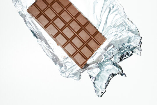 Sweet candy delicious tasty chocolate bar with hard direct flash