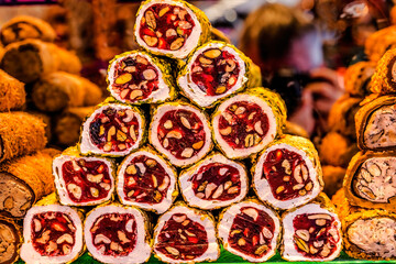 Colorful Turkish delight, lokum dessert, pastry shop, Grand Bazaar, Istanbul, Turkey. Turkish delight is a dessert gel made from sugar and starch. First made in 1700's from different types of nuts.