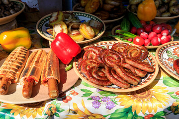 Ukraine, Kiev, Kyiv. Pork and beef wurst being served at a picnic. Village of Olkhovsky outside the city.