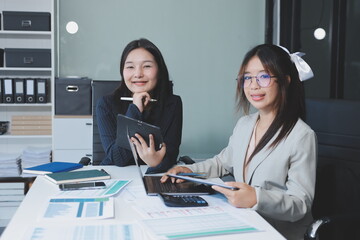 Team of business people are meeting to analyze data for marketing plan,Market research reports and income statistics, Financial and Accounting concept.