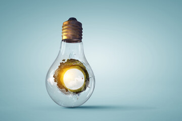 Green landscape inside light bulb