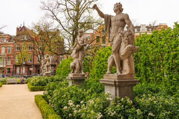 Fototapeta premium Netherlands, Holland. Sculptures in a canal-side park.