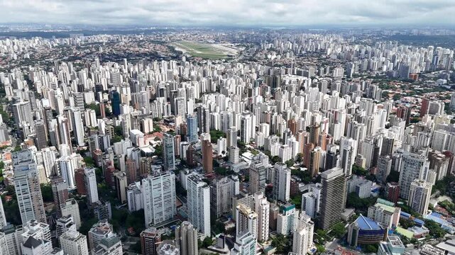 Aerial video above Parque Ibirapuera Sao Paulo on a sunny day