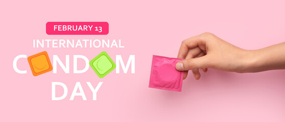 Female hand with wrapped condom on color background