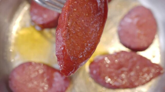 closeup of fork pick Frying sucuk