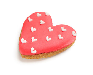 Red heart shaped cookie on white background. Valentine's Day celebration