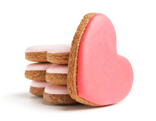 Many tasty heart shaped cookies on white background