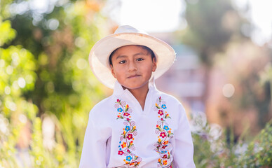 Young boy wearing traditional clothes celebrating national holiday. Dia de la hispanidad