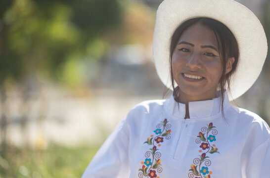 Smiling woman wearing traditional cayambe clothes celebrating national hispanic heritage month.