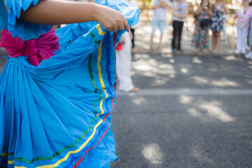 Dancer wearing traditional dress performing at columbus day parade. Dia de la hispanidad