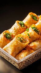 Delicious vegetarian spring rolls served in an elegant tray.