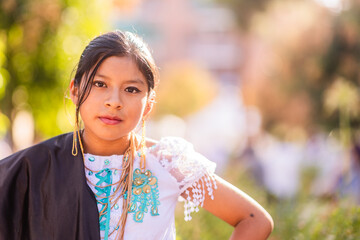 Young girl wearing traditional clothes celebrating hispanic heritage. Dia de la hispanidad