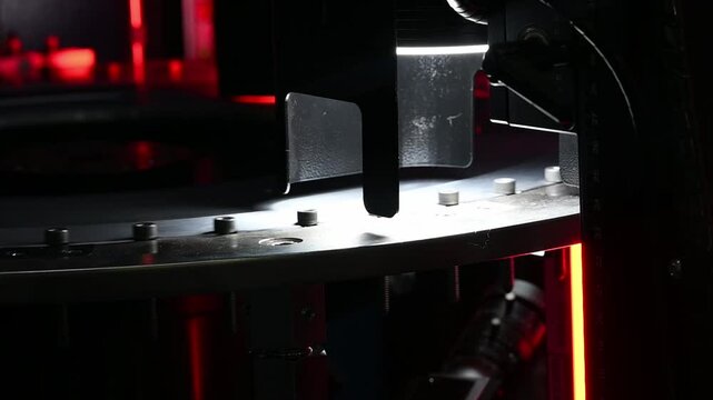 Slow motion scene operation of screw vision machine.