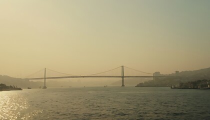 Obraz premium Foggy Morning Over the Bosphorus Strait with Bridge and Skyline. 20