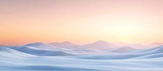Fototapeta premium Serene sunset over snow-covered mountains.