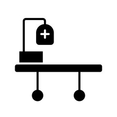Patient bed icon in glyph style