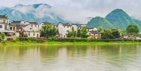 Fototapeta premium Tourism Scenery of Ancient Towns, Ancient Buildings, and Rivers in the Mountainous Areas of Anhui Province, China On April 22, 2024