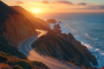 Fototapeta premium Coastal road winding along ocean cliffs at sunset