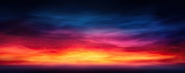 Obraz premium Fire abstract background concept. A vibrant sunset sky painted in hues of orange, pink, purple, and blue.