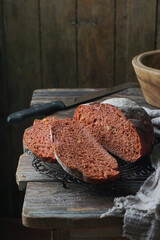 Sourdough bread is a type of bread made by fermenting dough using naturally occurring Lactobacillaceae bacteria and wild yeast before baking.