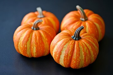 Fototapeta premium Halloween pumpkins on a black background. Selective focus.