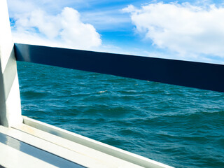 Fototapeta premium View on boat sea blue with cloud sky, summer coast island scene mockup water nature travel vacation holidays tropical, mockup ocean ecosystem energy change environment