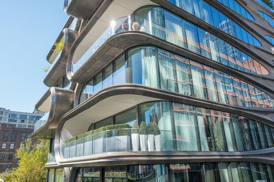Fototapeta Modern apartment building with floor-to-ceiling windows seen in New York