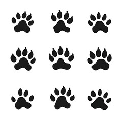 Fototapeta premium Nine Black Paw Prints on a White Background