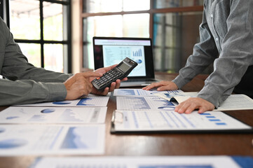 Finance adviser analyze financial statement to view performance company for investment planning and evaluate value business.