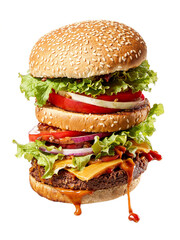 Juicy cheeseburger with lettuce, tomato, and onion on sesame seed bun.