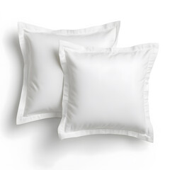 Soft white pillows with simple stitched edges for cozy touch